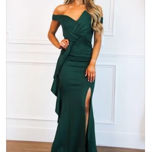 BNWT deep emerald green colored gown. Form fitting and gorgeous.
